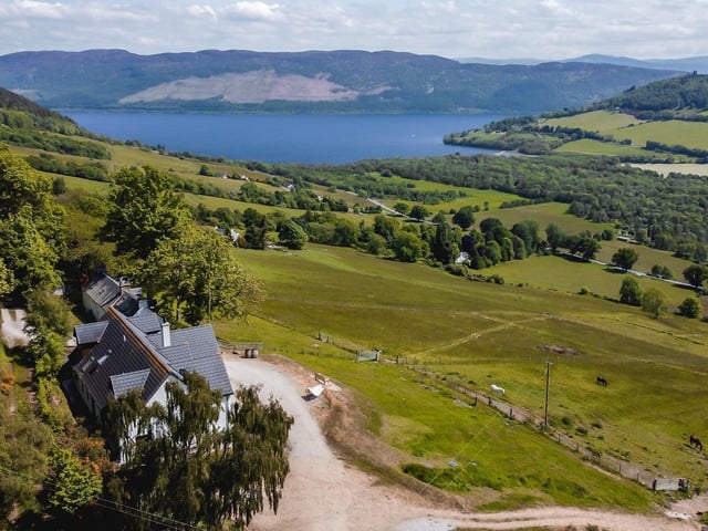 What is it? A contemporary detached family home, plus 19th-Century cottage and equestrian facilities, all overlooking the village of Drumnadrochit and Loch Ness.