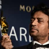 Best Actor winner Irrfan Khan poses with his trophy during the Asian Film Awards in Macau. Acclaimed Indian actor Irrfan Khan, whose international movie career included hits like "Slumdog Millionaire", "Life of Pi" and "The Amazing Spider-Man", has died aged just 53