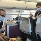 Staff serving food on the first BA holiday flight back to Lisbon.