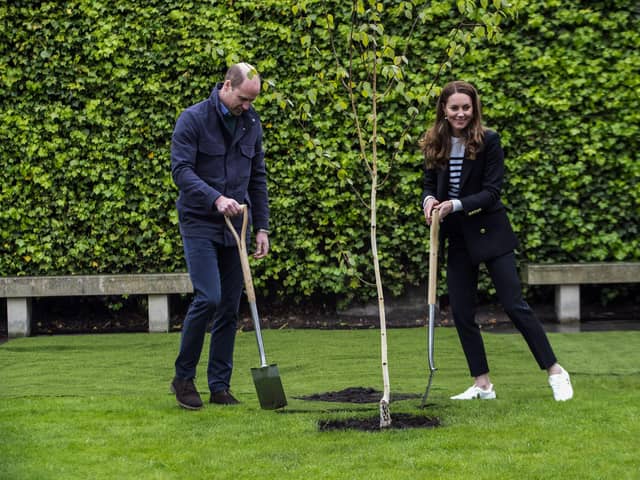 Prince William and Kate plant the first tree for the St Andrews Forest, one of the key initiatives in St Andrews University’s action plan to become carbon neutral by 2035 (Picture: Andy Buchanan/PA)