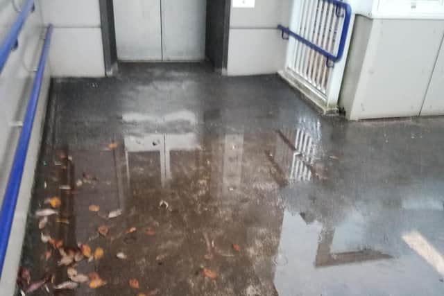 Water pooling beside lifts on a station footbridge built only a decade ago. Picture: The Scotsman