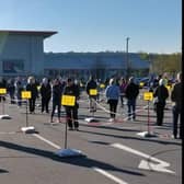 Shoppers line the car park outside B&Q in Aberdeen. Picture: Angus Marshall