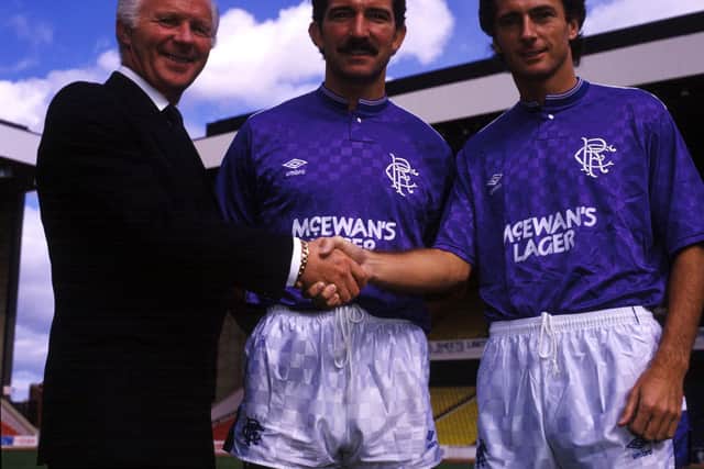 Trevor Francis (right) is welcomed by Ibrox by chairman Holmes and player/manager Souness.