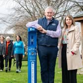 Ballater Walking Festival committee, and Richard & Jo from Ballater & Crathie Community Council, with Scottish Water's Chief Operating Officer Peter Farrer and Cllr Sarah Brown. (Pic: Michael Traill)