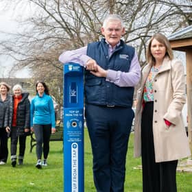 Ballater Walking Festival committee, and Richard & Jo from Ballater & Crathie Community Council, with Scottish Water's Chief Operating Officer Peter Farrer and Cllr Sarah Brown. (Pic: Michael Traill)