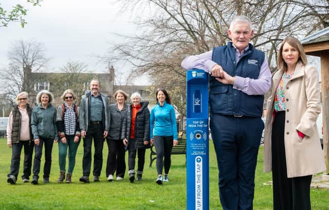 Ballater Walking Festival committee, and Richard & Jo from Ballater & Crathie Community Council, with Scottish Water's Chief Operating Officer Peter Farrer and Cllr Sarah Brown. (Pic: Michael Traill)