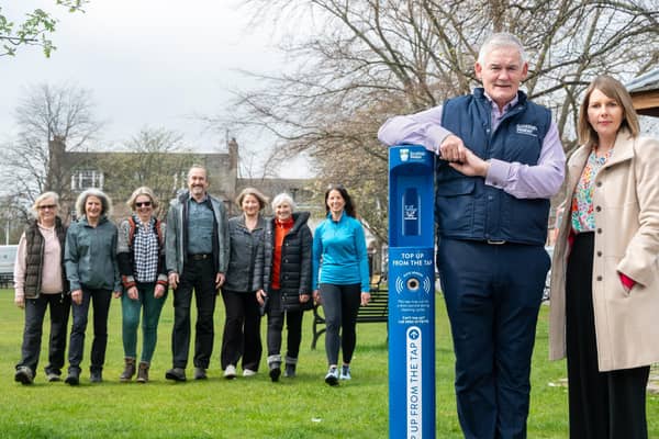 Ballater Walking Festival committee, and Richard & Jo from Ballater & Crathie Community Council, with Scottish Water's Chief Operating Officer Peter Farrer and Cllr Sarah Brown. (Pic: Michael Traill)