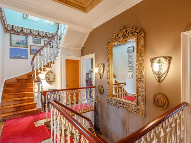 Period features are found throughout this unique property. The original safe remains and makes a great wine cellar.