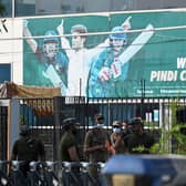Policemen stand guard outside the Rawalpindi Cricket Stadium in Rawalpindi after New Zealand postponed a series of one-day international (ODI) cricket matches against Pakistan over security concerns. Now England have followed suit. (Photo by AAMIR QURESHI/AFP via Getty Images)