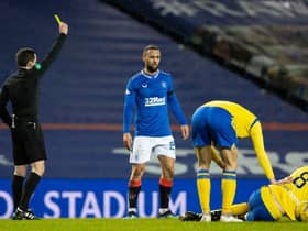 Rangers' Kemar Roofe (centre) is booked for a challenge on Murray Davidson during the Scottish Premiership match between Rangers and St Johnstone at Ibrox Stadium, on February 03, 2021, in Glasgow, Scotland. (Photo by Alan Harvey / SNS Group)