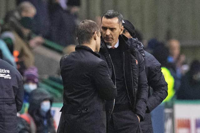 Aberdeen manager Stephen Glass shake hands with new Hibs boss Shaun Maloney (Photo by Ross Parker / SNS Group)
