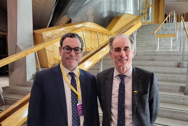 Mark Sabah, director of the Committee for Freedom in Hong Kong Foundation, left, with founder Mark Clifford on a visit to Holyrood.