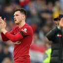Andy Robertson applauds the Liverpool fans after the 2-2 draw with Arsenal at Anfield. (Photo by Shaun Botterill/Getty Images)