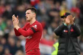 Andy Robertson applauds the Liverpool fans after the 2-2 draw with Arsenal at Anfield. (Photo by Shaun Botterill/Getty Images)