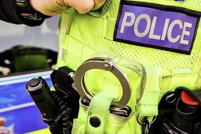 A residential street in Edinburgh was swarming with police on Monday after reports of a 'man with a knife'.
