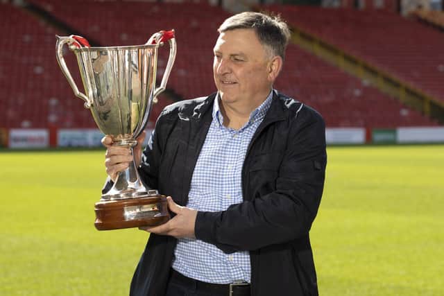 John Hewitt as he is now, aged 60. With the European Cup Winners' Cup at Pittodrie in March (Photo by Alan Harvey / SNS Group)