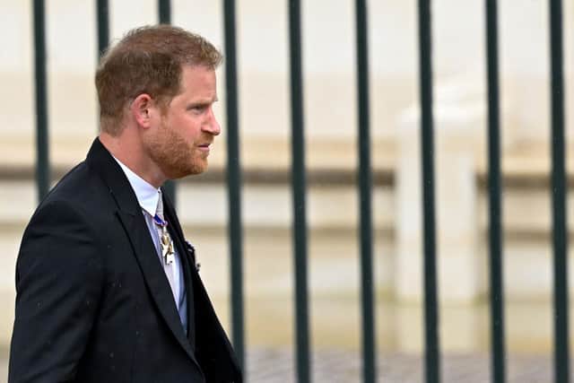Prince Harry, Duke of Sussex, arrives to attend the Coronation of King Charles III and Queen Camilla. Picture: Toby Melville - WPA Pool/Getty Images
