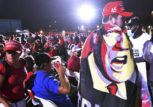 Supporters of Donald Trump gather for a campaign rally in Florida on Sunday. Picture: Jim Rassol/AP.
