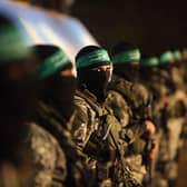Members of the Izz ad-Din al-Qassam Brigades, the armed wing of the Hamas movement (Photo: MAHMUD HAMS/AFP via Getty Images)