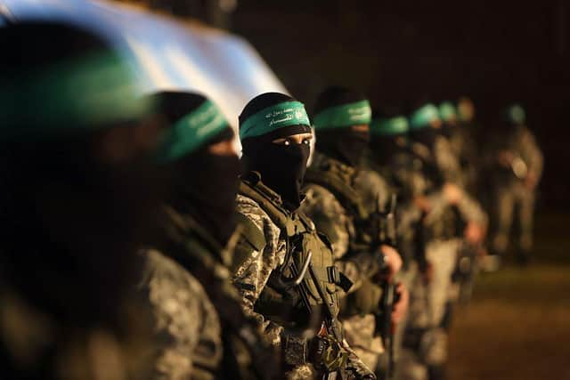 Members of the Izz ad-Din al-Qassam Brigades, the armed wing of the Hamas movement (Photo: MAHMUD HAMS/AFP via Getty Images)