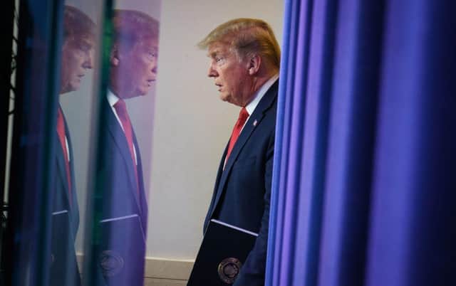 President Donald Trump outlined plans to loosen social distancing measures on April 16 (Getty Images)