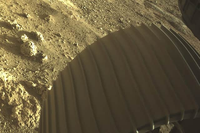 High-resolution image showing one of the six wheels aboard NASA's Perseverance Mars rover after it touched down on Mars on Thursday (Photo: NASA/JPL-Caltech).