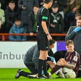 Frankie Kent injured his knee playing for Hearts against Hibs.