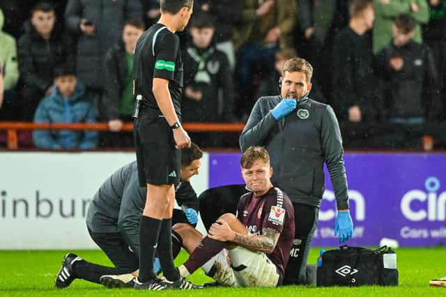 Frankie Kent injured his knee playing for Hearts against Hibs.