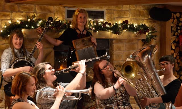 Alex (on trombone) with all girl jazz band The Red Hot Rhythm Makers. Alex and two of her band mates feature for the Christmas Concert
