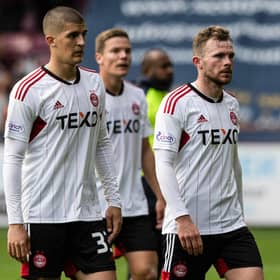 Aberdeen's Slobodan Rubezic and Nicky Devlin look dejected at full time after the 2-0 defeat by Hearts.