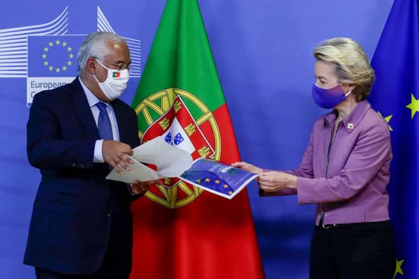 Portugal Prime Minister Antonio Costa gives a report as he is welcomed by European Commission president Ursula von der Leyen (right) prior to a meeting ahead of a two days European Union (EU) summit in Brussels. European leaders are meeting to re-examine the post-Brexit talks under pressure from Boris Johnson to give ground or see Britain walk away with no trade deal. Picture: Olivier Hoslet/POOL/AFP via Getty Images