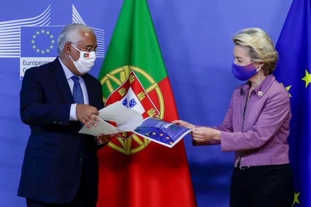 Portugal Prime Minister Antonio Costa gives a report as he is welcomed by European Commission president Ursula von der Leyen (right) prior to a meeting ahead of a two days European Union (EU) summit in Brussels. European leaders are meeting to re-examine the post-Brexit talks under pressure from Boris Johnson to give ground or see Britain walk away with no trade deal. Picture: Olivier Hoslet/POOL/AFP via Getty Images
