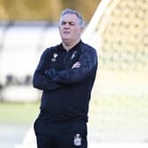 Owen Coyle supervises training this week in preparation for Queen's Park's crunch games against their two nearest challengers for the Championship title