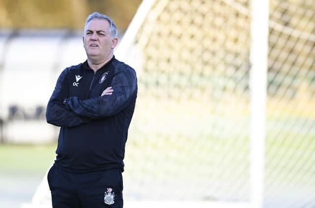 Owen Coyle supervises training this week in preparation for Queen's Park's crunch games against their two nearest challengers for the Championship title