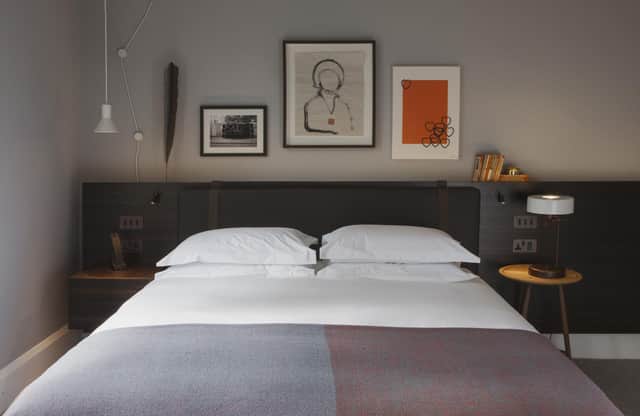 Artworks throughout the hotel extend to the bedrooms where the vibe is a balance between luxury and homely. Pic: Contributed