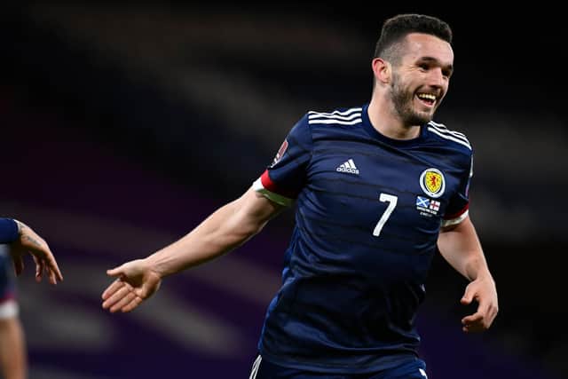 John McGinn celebrates after scoring his second, and Scotland's second, in the 4-0 win over the Faroe Islands that allowed him to create history with his quickfire time frame for netting a first 10 goals for the country. (Photo by Rob Casey / SNS Group)