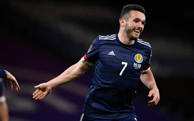 John McGinn celebrates after scoring his second, and Scotland's second, in the 4-0 win over the Faroe Islands that allowed him to create history with his quickfire time frame for  netting  a first 10 goals for the country.  (Photo by Rob Casey / SNS Group)
