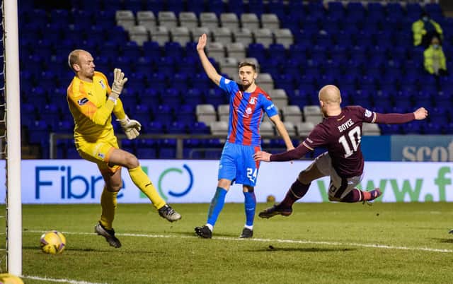 Hearts' Liam Boyce scores the equaliser at Inverness.