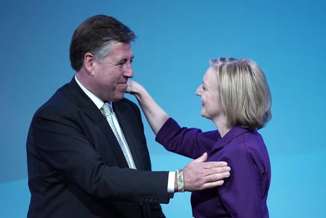 Conservative MP Sir Graham Brady congratulates Foreign Secretary Liz Truss as she is announced as the next Prime Minister at the Queen Elizabeth II Centre. She defeated rival Rishi Sunak by 81,326 votes to 60,399 to win the Tory leadership, and will replace Boris Johnson in No 10 on Tuesday.