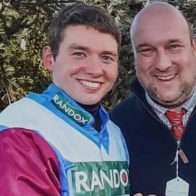 Jockey Derek Fox pictured at Aintree with Bruce Jeffrey after winning the 2017 Randox Grand National on One For Arthur