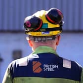 A worker stands waiting to see Chancellor Rachel Reeves during a visit to the Britiish Steel plant in Scunthorpe in April  (Picture: Danny Lawson/WPA Pool/Getty Images)