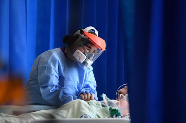 The NHS risks a downward spiral towards a service of last resort for the poorest (Picture: Neil Hall/pool/AFP via Getty Images)