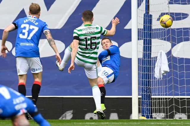 Steven Davis opens the scoring for Rangers against Celtic at Ibrox with an acrobatic close range shot. (Photo by Rob Casey / SNS Group)
