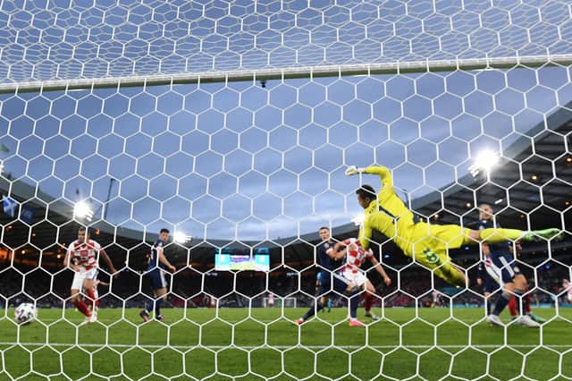 Scotland's goalkeeper David Marshall concedes a third goal during the UEFA Euro 2020 match between Croatia and Scotland at Hampden this week. (Picture: Paul ELLIS / AFP) (Photo by Paul Ellis/AFP via Getty Images)