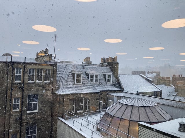 Snow is falling near George Street