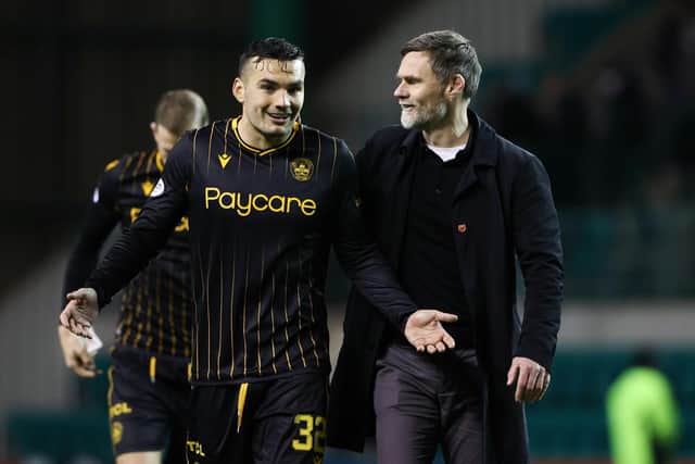Motherwell's Tony Watt (L) and Graham Alexander at full time.