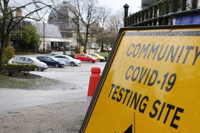 A Covid sign outside a community coronavirus testing centre.