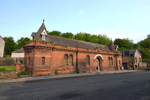 The distinctive red sandstone building at 55 Abbeyhill, Edinburgh forms the main part of the sale. Picture: Allied Surveyors Scotland Ltd