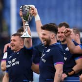 Ali Price of Scotland lift the Cuttitta Cup after a 33-22 Six Nations win over Italy.