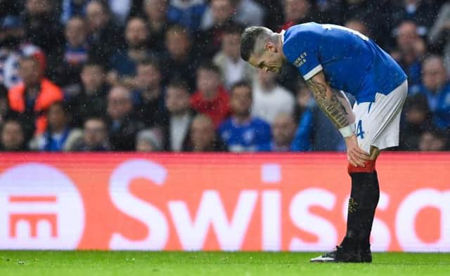 Ryan Kent reacts after pulling up with a hamstring injury during Rangers' Europa League defeat against Lyon at Ibrox on Thursday night. (Photo by Craig Foy / SNS Group)